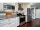 Well-equipped kitchen with stainless steel appliances, granite countertops, and ample storage space at 4940 Lambs Road Rd, North Charleston, SC 29418