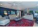 Cozy living room with comfortable seating, stylish decor, and hardwood floors at 4940 Lambs Road Rd, North Charleston, SC 29418