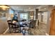 Open-concept living and dining area with hardwood floors and comfortable seating at 4940 Lambs Road Rd, North Charleston, SC 29418