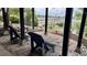 Relaxing outdoor seating area with water views and a wooden dock at 4940 Lambs Road Rd, North Charleston, SC 29418