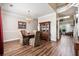Elegant dining room features hardwood floors, a charming chandelier, and a built-in china cabinet at 5413 Barnsley Dr, North Charleston, SC 29420