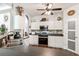 Cozy kitchen with white cabinets, tile backsplash, and modern appliances at 5413 Barnsley Dr, North Charleston, SC 29420