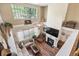 Bright and airy living room with high ceilings, a fireplace, and large windows at 5413 Barnsley Dr, North Charleston, SC 29420