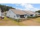 A fenced backyard with a screened-in porch offers outdoor living space and privacy at 629 Snow Owl Dr, Summerville, SC 29486