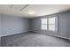 Bedroom with carpet, neutral paint, natural light from two windows at 629 Snow Owl Dr, Summerville, SC 29486