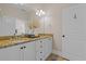 Bathroom with dual sinks, granite countertops, white cabinetry and modern lighting at 656 Coleman Blvd # 405, Mount Pleasant, SC 29464
