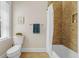 Bathroom boasts tiled shower and floors, modern fixtures, and ample natural light at 656 Coleman Blvd # 405, Mount Pleasant, SC 29464