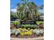 Welcoming community entrance sign surrounded by lush landscaping and vibrant flowers for a beautiful street view at 656 Coleman Blvd # 405, Mount Pleasant, SC 29464
