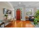 Inviting foyer with a study nook, rich hardwood floors, and a bright, airy ambiance at 656 Coleman Blvd # 405, Mount Pleasant, SC 29464