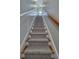 Carpeted staircase with painted risers and white trim, leading to the upper level at 656 Coleman Blvd # 405, Mount Pleasant, SC 29464