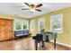 Bright bonus room featuring a piano and hardwood flooring at 7 Sconesill Ln, Charleston, SC 29414