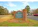 Elegant community sign with brick base and lush landscaping, welcoming residents and guests to Shadowmoss Plantation at 7 Sconesill Ln, Charleston, SC 29414
