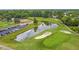Scenic view of a golf course featuring a water hazard and sand traps at 7 Sconesill Ln, Charleston, SC 29414