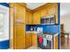 Kitchen with stainless steel appliances and wooden cabinets at 7 Sconesill Ln, Charleston, SC 29414