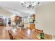 Open floor plan with living room and kitchen, highlighted by stone fireplace at 7 Sconesill Ln, Charleston, SC 29414