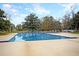 Large community swimming pool with ample deck space for lounging, perfect for relaxation and recreation at 7 Sconesill Ln, Charleston, SC 29414