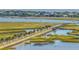 Stunning aerial view of a causeway lined with palm trees and picturesque waterfront scenery at 707 Royall Ave, Mount Pleasant, SC 29464