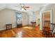 Bright bedroom with hardwood floors, ceiling fan, and spacious layout at 707 Royall Ave, Mount Pleasant, SC 29464