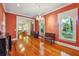 Formal dining room featuring a chandelier, and a hall leading into the living room at 707 Royall Ave, Mount Pleasant, SC 29464