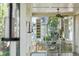 Close up of porch with unique lighting and a cozy outdoor seating area at 707 Royall Ave, Mount Pleasant, SC 29464