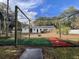 Backyard featuring a baseball batting cage, enhancing the home's recreational appeal at 922 Dill Ave, Charleston, SC 29412
