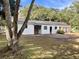 Backyard view of the house, with a brick patio, offering a relaxing outdoor space at 922 Dill Ave, Charleston, SC 29412