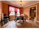 Cozy dining room with natural light and seating for four at 922 Dill Ave, Charleston, SC 29412
