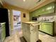 Spacious kitchen featuring stainless steel appliances and a portable island at 922 Dill Ave, Charleston, SC 29412