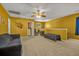 Large bonus room with a comfortable seating area and an office nook at 9759 Seed St, Ladson, SC 29456