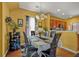 Stylish dining room with modern decor, a chandelier and a view of the kitchen at 9759 Seed St, Ladson, SC 29456
