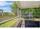 Spacious screened porch perfect for outdoor entertaining and relaxation at 9759 Seed St, Ladson, SC 29456