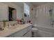 Clean bathroom features a shower-tub combo and a large vanity with ample counter space at 101 Old Tree Rd, Goose Creek, SC 29445