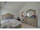 Spacious bedroom featuring a large dresser and a view into the bathroom at 101 Old Tree Rd, Goose Creek, SC 29445