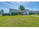 Well-maintained single-story home showcasing lush green lawn and inviting curb appeal at 101 Old Tree Rd, Goose Creek, SC 29445