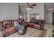 Spacious living room with ceiling fan and neutral walls, awaiting your personal touch at 101 Old Tree Rd, Goose Creek, SC 29445