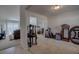 Open living area with carpet, showcasing seamless flow to other rooms at 101 Old Tree Rd, Goose Creek, SC 29445