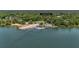 Waterfront property aerial view with direct access, highlighting its unique location with a dock and mature trees at 1010 Black Oak Rd, Bonneau, SC 29431