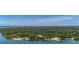 Expansive aerial view of a waterfront property featuring lush greenery and direct water access at 1010 Black Oak Rd, Bonneau, SC 29431