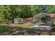 Backyard features a storage shed and a metal carport at 1010 Black Oak Rd, Bonneau, SC 29431