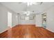 Spacious bonus room with wood floors, ceiling fans, built-in shelving, and ample natural light at 1010 Black Oak Rd, Bonneau, SC 29431