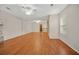Spacious living room with hardwood floors, large windows, and an open layout, perfect for entertaining at 1010 Black Oak Rd, Bonneau, SC 29431