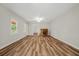 Spacious living room with wood floors, natural light, and neutral paint at 1010 Black Oak Rd, Bonneau, SC 29431