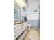Bathroom featuring blue walls, a white vanity with a cream countertop, and a shower with a patterned curtain at 1116 Daffodil Ln, Mount Pleasant, SC 29464