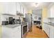 Bright kitchen features stainless steel appliances, granite countertops, and ample cabinet space at 1116 Daffodil Ln, Mount Pleasant, SC 29464