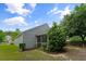 Backyard featuring a screened porch with a siding exterior and surrounded by greenery at 1216 Wild Goose Trl, Summerville, SC 29483