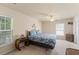 Spacious bedroom with carpet, natural light, ceiling fan, and complementing decor at 1216 Wild Goose Trl, Summerville, SC 29483