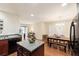 Open concept kitchen with granite countertops, stainless appliances, island and adjacent dining area at 1216 Wild Goose Trl, Summerville, SC 29483