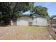 The property features a large backyard with three storage buildings, a chain link fence, and mature trees at 1232 Hawthorne Cir, Hanahan, SC 29410