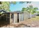 The property features a large backyard with storage buildings, fencing, and mature trees at 1232 Hawthorne Cir, Hanahan, SC 29410