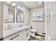 Updated bathroom featuring a double sink vanity with modern fixtures and a view of the combination shower-tub at 1232 Hawthorne Cir, Hanahan, SC 29410